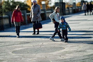 A family trip to a public park in Norway, Vigelandsparken or Frognerparken. 