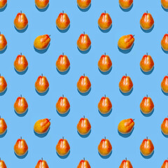 Juicy pears background. Colorful seamless pattern of fresh pears on a blue background. Fresh ripe organic pears isolated on a blue surface. Vegan, vegetarian healthy food.