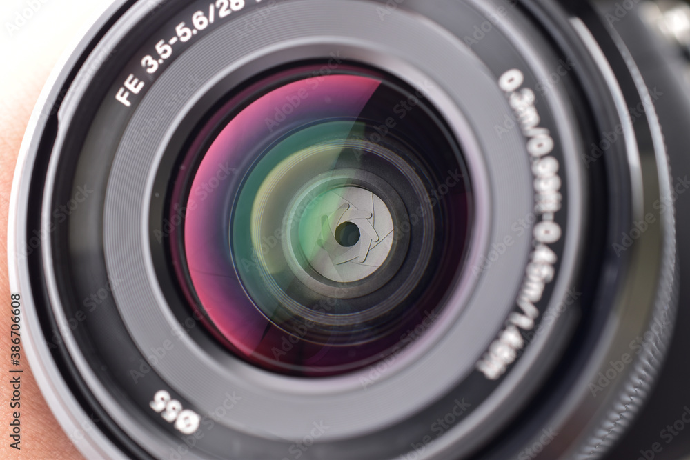 Wall mural Close up of optical lens, camera lens macro, closed aperture