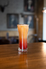 Cocktail Tequila Sunrise in a French Bistrot, restaurant