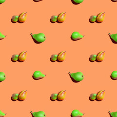 Pears pattern. Fruit seamless pattern of fresh pears on an orange background. Fresh ripe organic pears isolated on orange surface. Vegan, vegetarian healthy food.