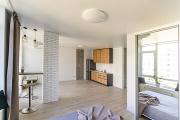 Kitchen and living room of loft apartment
