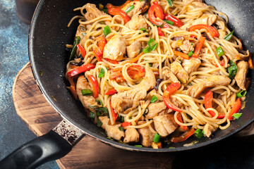 Chicken chow mein. Fried noodles with chicken and vegetables