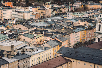 Europe old city roof top aerial foreshortening buildings from above Austria Salzburg