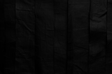 Black material. Crumpled Uneven Stripes Grunge Texture