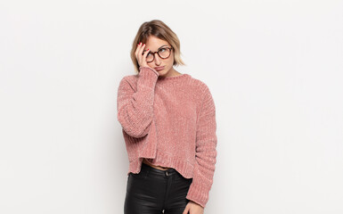 young pretty woman feeling bored, frustrated and sleepy after a tiresome, dull and tedious task,...
