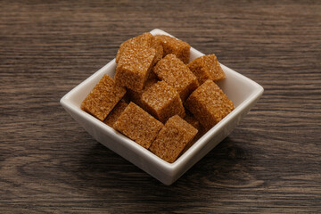 Cane sugar cubs in the bowl