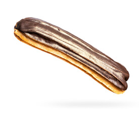 Delicious chocolate eclair close-up isolated on a white background