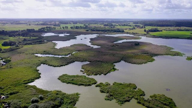 4k drone footage of Morag backwater in Morag town, Ostroda County, Warmia Mazury region of Poland