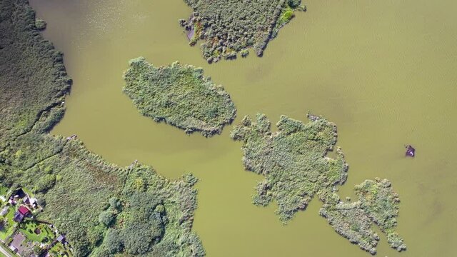 4k high angle view of Morag backwater in Morag town, Ostroda County, Warmia Mazury region of Poland
