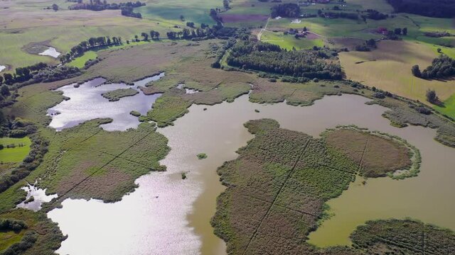 4k aerial footage of Morag backwater in Morag town in Warmia Mazury region of Poland
