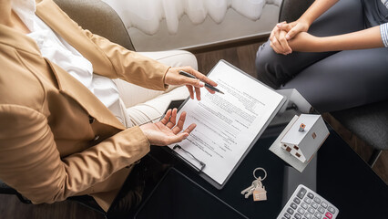Real estate agent and customer discussing for contract to buy, get insurance or loan real estate or...