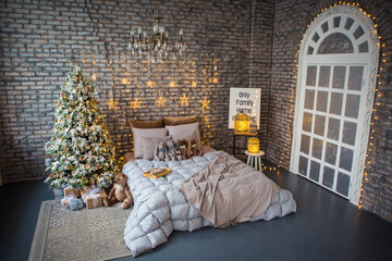 bed in the bedroom with Christmas and New Year decor