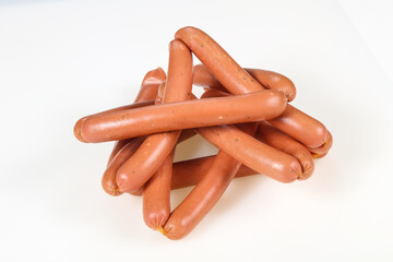 Tasty meat sausages over white background