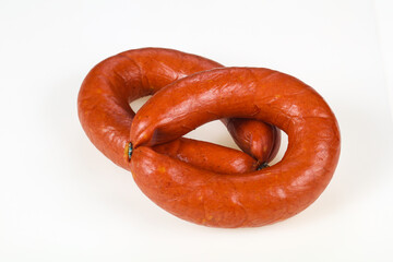 Tasty meat sausages over white background