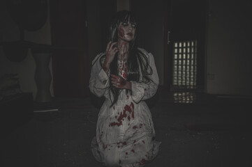 Portrait of asian woman make up ghost,Scary horror scene for background,Halloween festival...