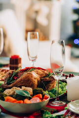 selective focus of table served with delicious turkey and vegetables for thanksgiving dinner