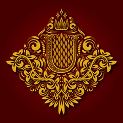 Letter U heraldic monogram in coats of arms form. Vintage golden logo with shadow on maroon background. Letter U is surrounded by floral elements of design.