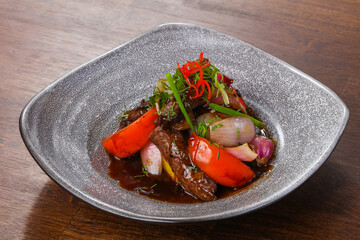Beef with teriyaki sauce and vegetables
