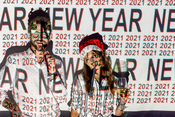 Couple celebrating New Year in nightclub