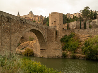 MEDIEVAL BRIDGE OVER THE TAJO RIVER IN TOLEDO, IMPERIAL CITY