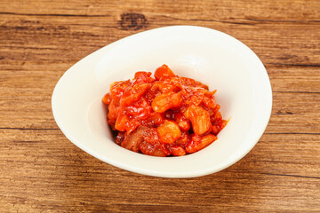 Baked kidney with tomato and pepper