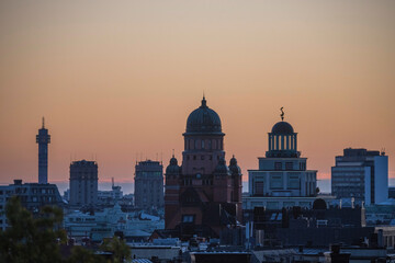 Fototapeta na wymiar View over towers and roofs in Stockholm an early morning before sunrise 