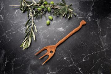 Fototapeta na wymiar hand crafted wooden fork in the kitchen