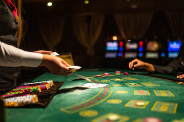 Casino Black Jack table with poker cards and chips.