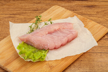 Raw turkey breast steak for cooking