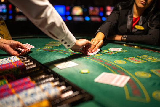 Casino Black Jack table with poker cards and chips.