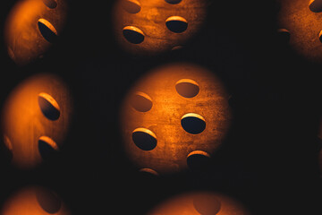 Fototapeta premium Inside of a metal cylinder with many holes around