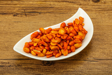 Chili peanut snack in the bowl