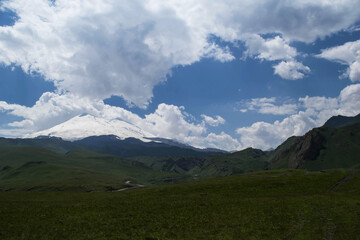 Fototapeta premium Mountain view. Mountains of the North Caucasus in summer. View of mount Elbrus. Eternal glacier.