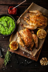 Grilled chicken with sauce and green peas