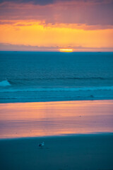 Fototapeta na wymiar Sunrise by the Ocean