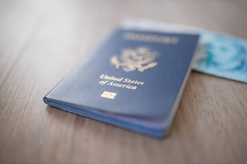 United States of America Passport with a Blurry Five Pound Note Inside