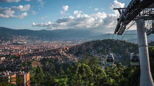 Zoom out time time lapse view of the public metro cable car transit system in Medellin, Antioquia Department, Colombia.
