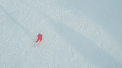Man doing winter sport outside. Shot from above.