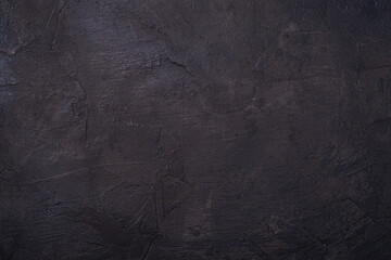 Cement dark black color textured background, stone concrete loft design wall