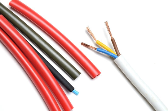 heat shrink tubing and a three-core stripped wire on a white background.