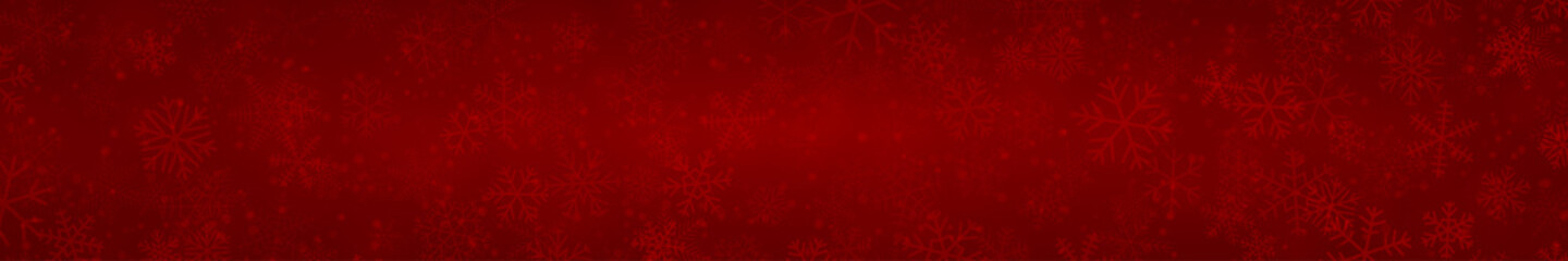 Obraz na płótnie Canvas Christmas banner of snowflakes of different shapes, sizes and transparency on red background