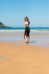 Young caucasian girl posing at La Concha bay in Donostia-San Sebastian; Basque Country.