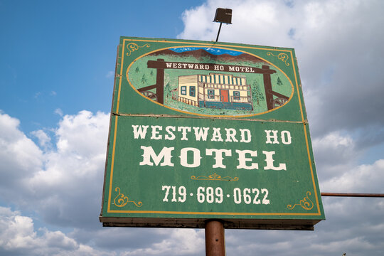 Cripple Creek, Colorado - September 16, 2020: Sign for the abandoned Westward Ho Motel against a cloudy sky