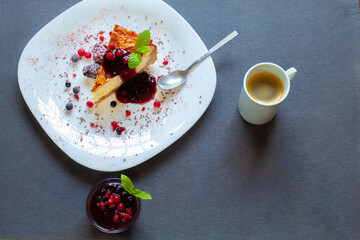 red fruit cheesecake and a cup of coffee