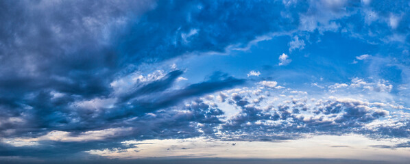 Cold disturbing sky in clouds and clouds - a panoramic shot of the troposphere