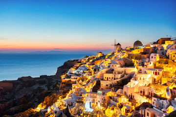 Illuminated Oia Village at Sunset on Santorini Island