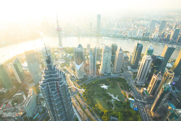 Naklejka premium Shanghai Aerial View at Sunset with Urban Skyscrapers over the River