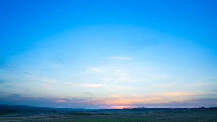 Fototapeta na wymiar Beautiful textured sky with clouds at sunset