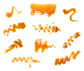Set with samples of caramel sauce on white background